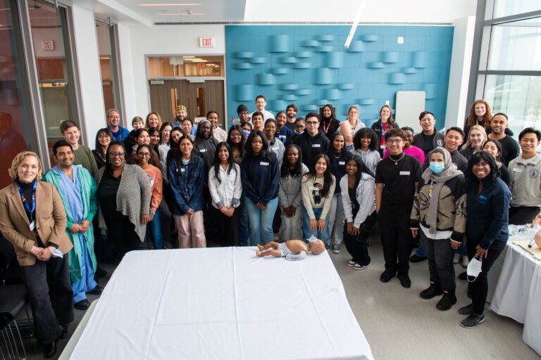 Group photo of staff and participants at the 'ER Discovery Skills Day' event held at Sunnybrook Health Sciences Center