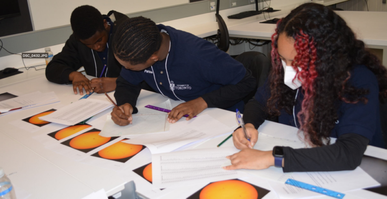Pursue STEM students working on an assignment